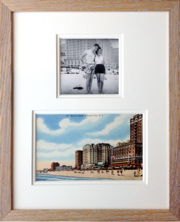 Framed vintage postcard and photo