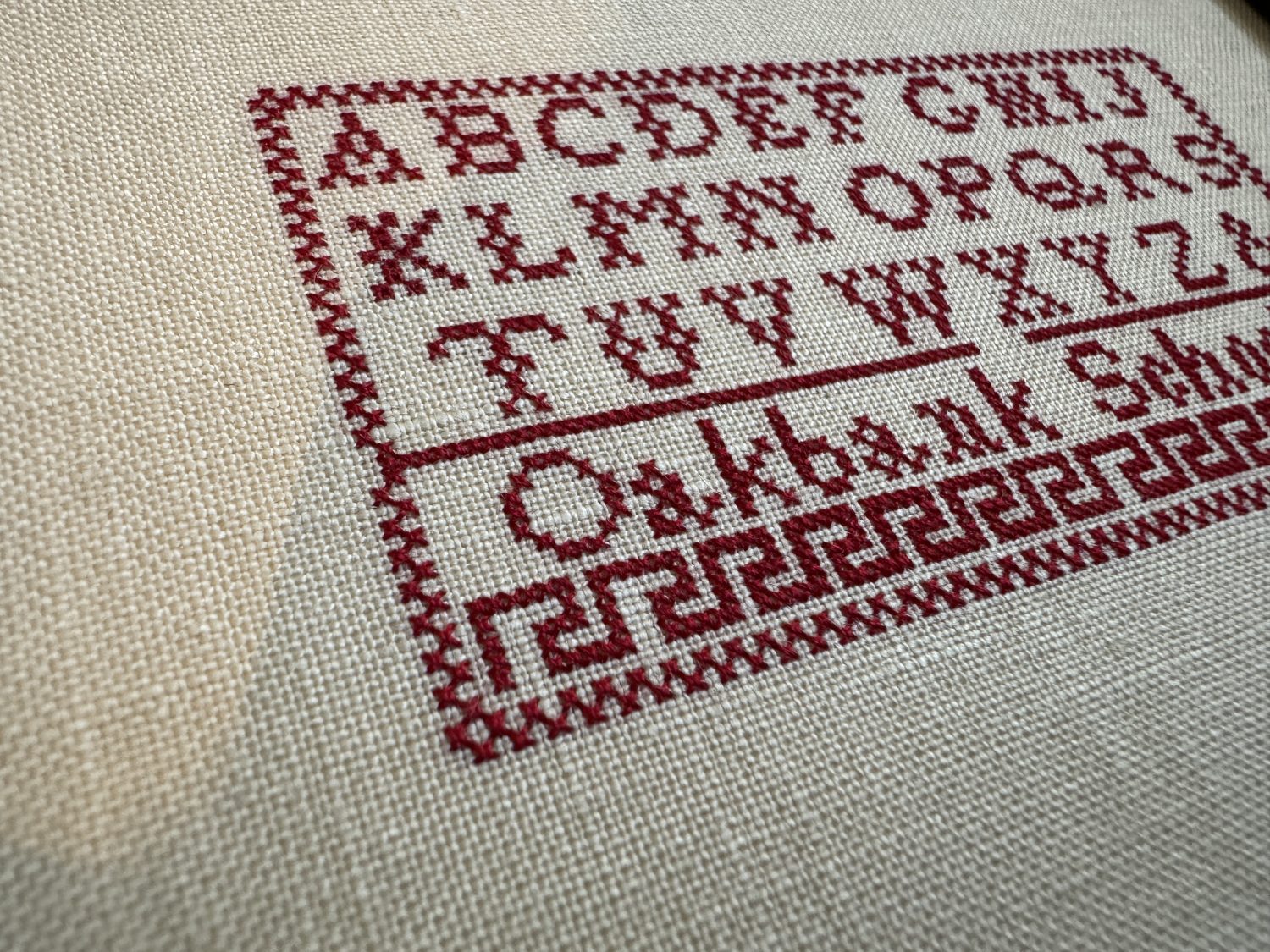 cross-stitch sampler custom framing