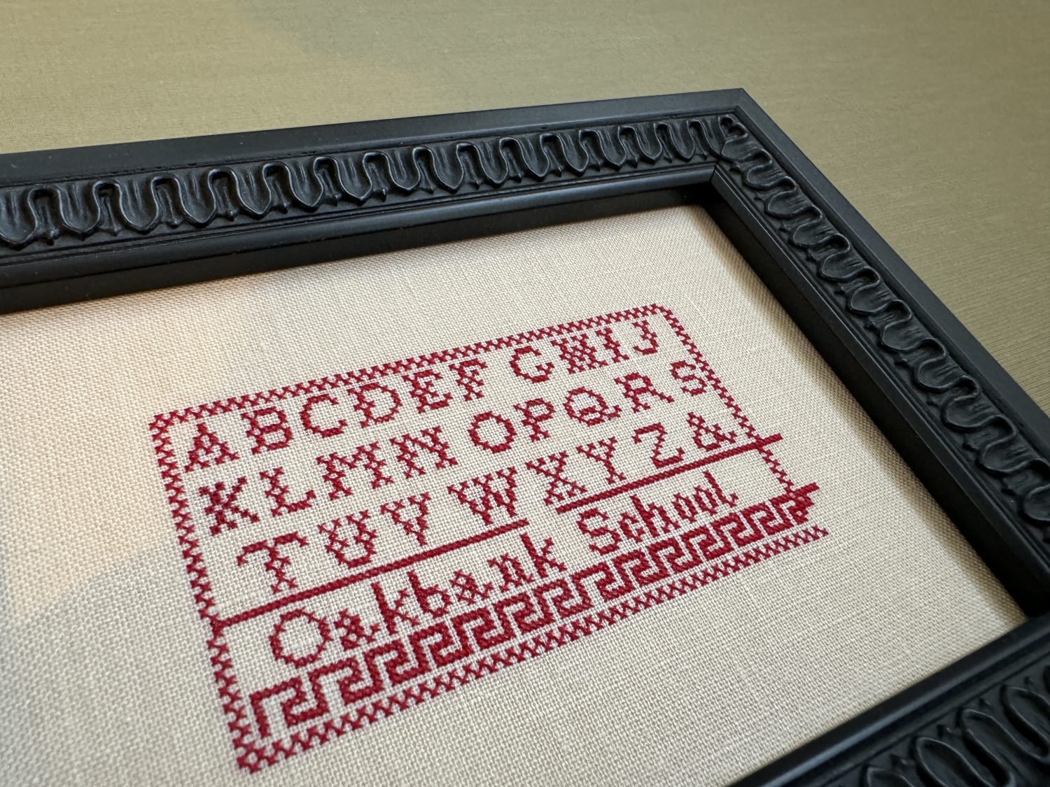 Needlework Sampler custom framing